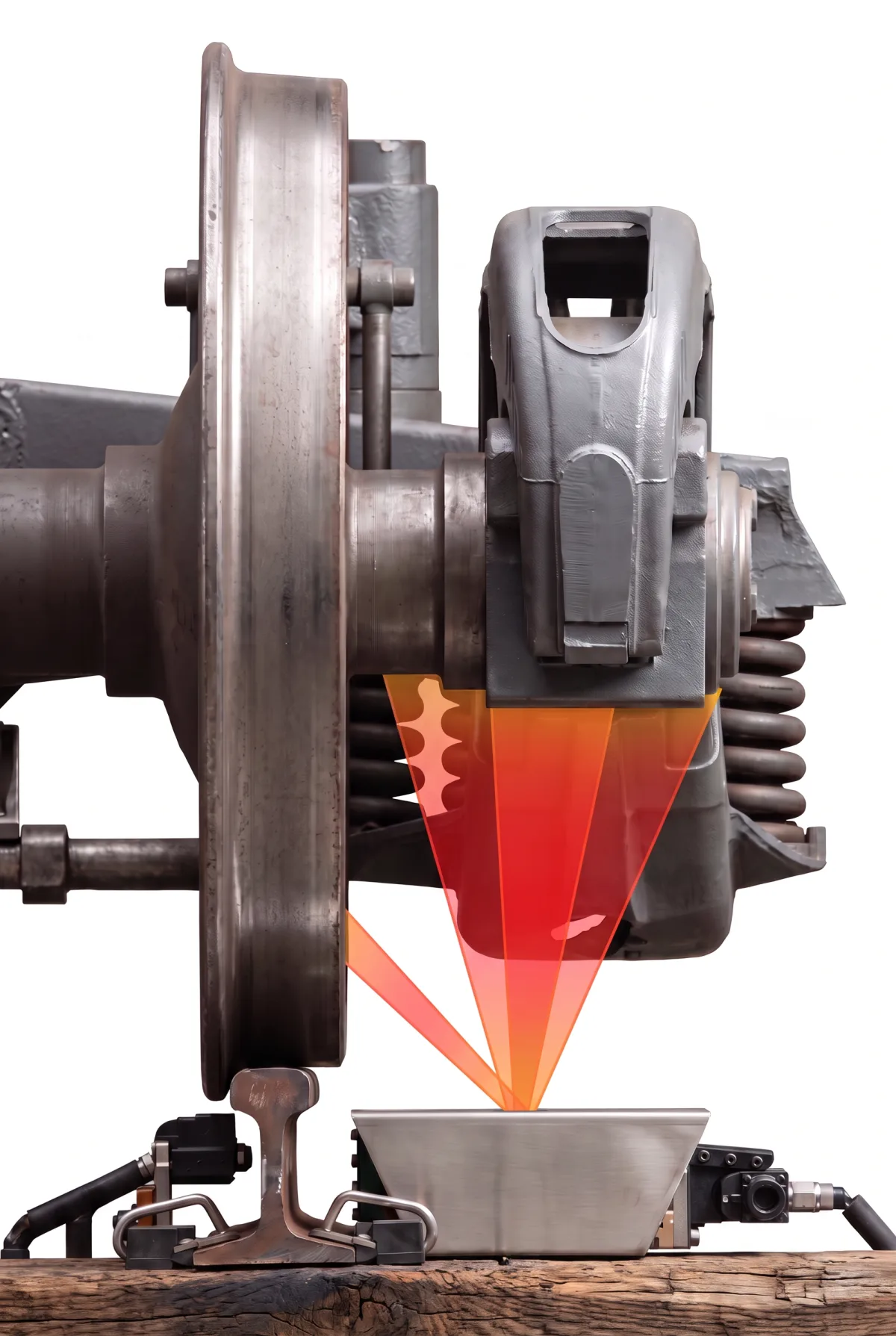 Multibeam infrared beams from a rail-clamped BearingMAP unit aimed at a passing journal bearing and wheel